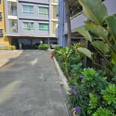 Exterior view of a building with surrounding greenery