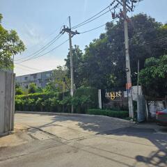 Exterior view of a residential area with lush greenery