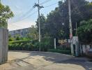 Exterior view of a residential area with lush greenery