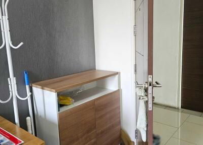 Entryway with a storage cabinet and coat rack