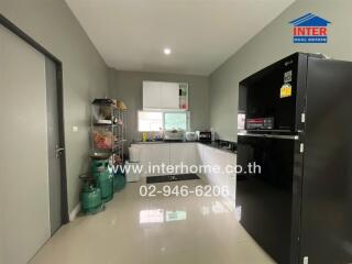 Modern kitchen with appliances and shelving