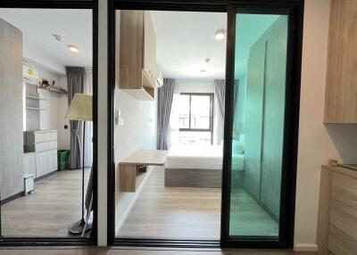 Modern bedroom with sliding glass doors