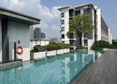 Modern apartment complex with a swimming pool