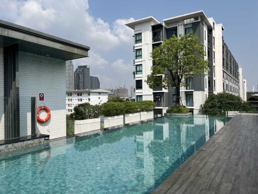 Modern apartment complex with a swimming pool