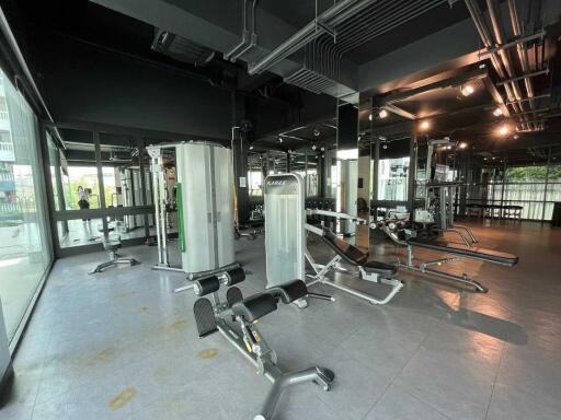 Modern fitness gym with various equipment