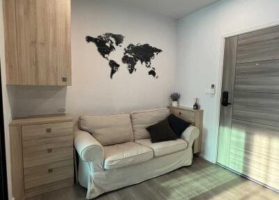 Cozy modern living room with wall map decoration