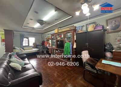Main living area with diverse furnishings and decor