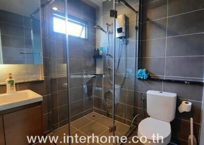 Modern bathroom with glass shower enclosure