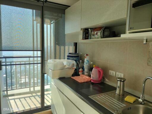 Modern kitchen with balcony view