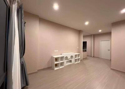 Spacious and empty living room with recessed lighting