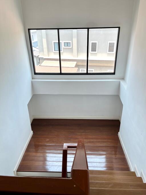 View of a stairwell with a large window