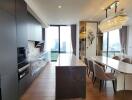 Modern kitchen and dining area with city view