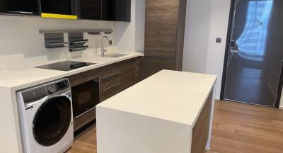 Modern kitchen with island and built-in appliances