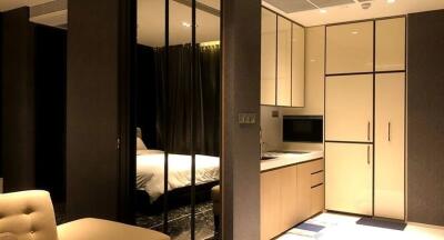 Modern studio apartment with bedroom and kitchen