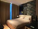 Modern bedroom with dark floral wallpaper, large window with drapes, and double bed with beige bedding