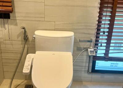 Modern bathroom with advanced toilet facilities