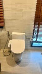 Modern bathroom with advanced toilet facilities