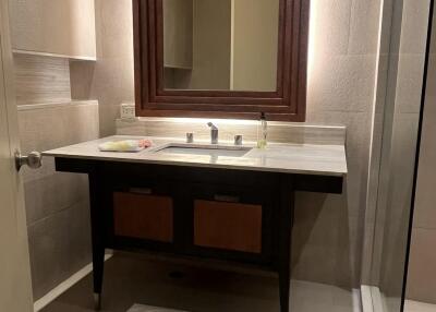Modern bathroom with vanity and large mirror