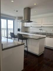 Modern kitchen with island and barstools