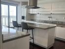 Modern kitchen with island and barstools