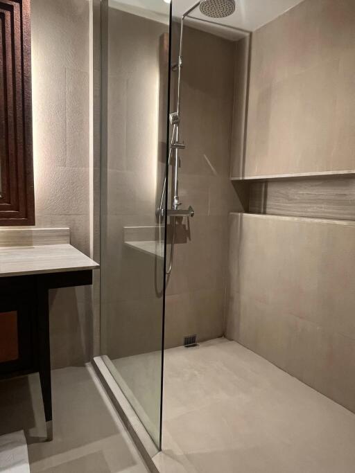 Modern bathroom with glass shower enclosure