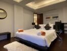 Modern bedroom with recessed lighting and stylish decor