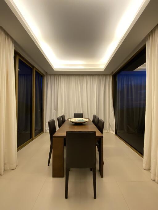 Elegant dining room with large windows