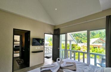 Spacious bedroom with balcony