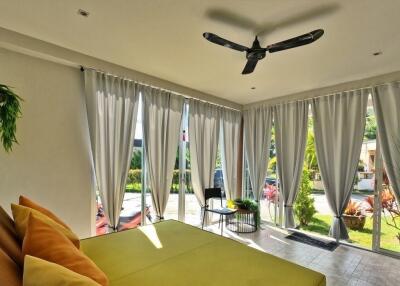 Bright living area with floor-to-ceiling windows