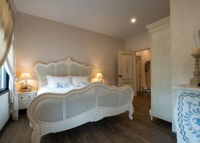 Elegant bedroom with vintage-style furniture