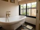 Bathroom with freestanding tub