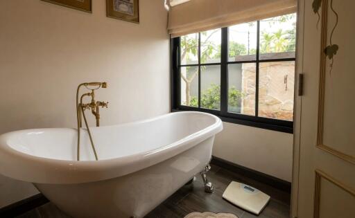 Bathroom with freestanding tub