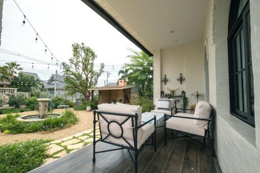 Outdoor patio with seating and garden view