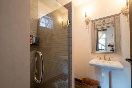 Elegant bathroom with shower and sink