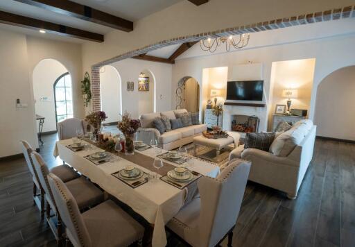 Warm and spacious living room with dining area