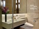 Modern bathroom with large mirror and contemporary fixtures