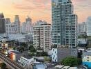 Skyline view with multiple high-rise buildings at sunset