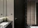 Modern bathroom with dark wood accents and marble countertops