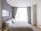 Contemporary bedroom with large window and natural light