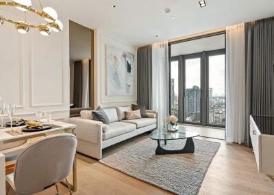 Modern living room with a sofa, dining area, glass coffee table, and city view.