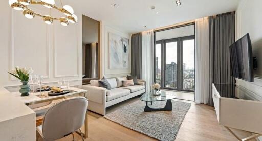 Modern living room with a sofa, dining area, glass coffee table, and city view.