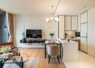 Modern living room with open kitchen and dining area