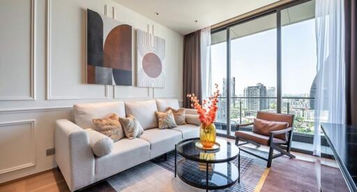 Modern living room with a large window and city view