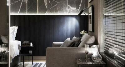 Modern bedroom with stylish decor and ambient lighting