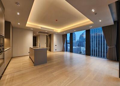 Modern living room with large windows and city view