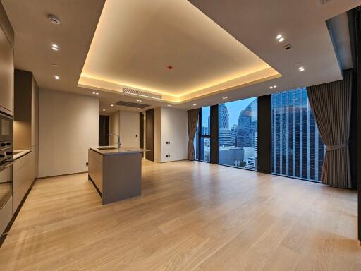 Modern living room with large windows and city view