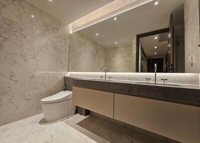 Modern bathroom with marble walls and double sink