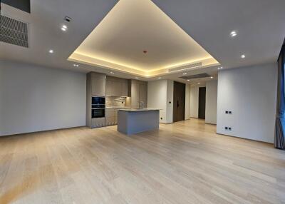 Spacious modern kitchen with central island and recessed lighting