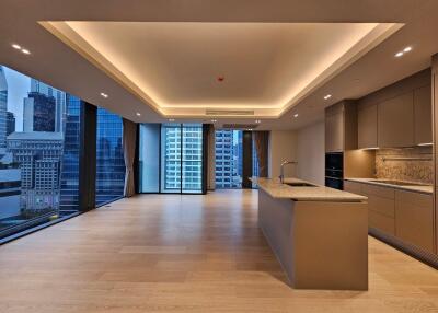 Modern kitchen and living area with city views