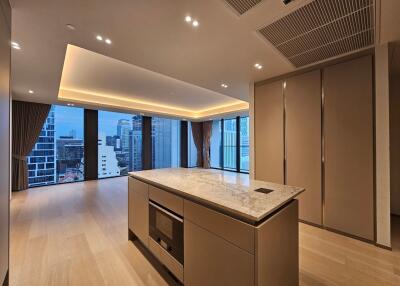 Modern kitchen with island and city view